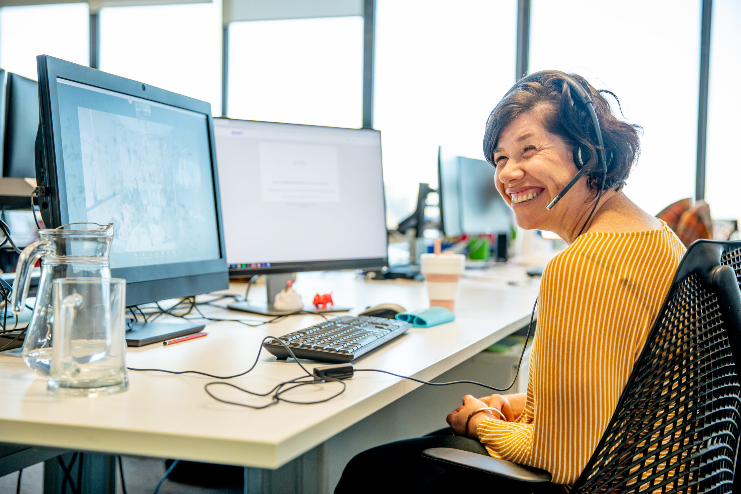 Women in an office environment working collaboratively - Repicturing Disability